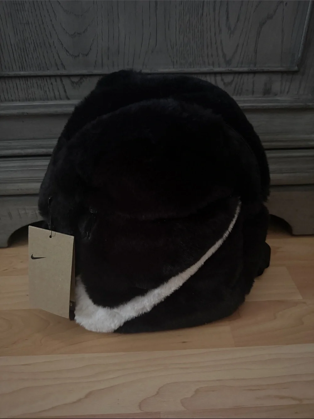 Nike Black Faux Fur Backpack with White Swoosh Accent